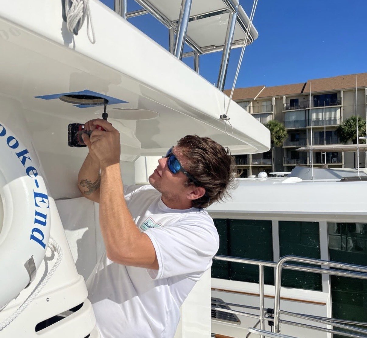 Chase installing marine electronics on a large yacht