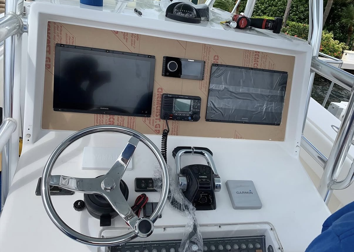 Invincible helm with new Garmin displays being fitted, protective film still on